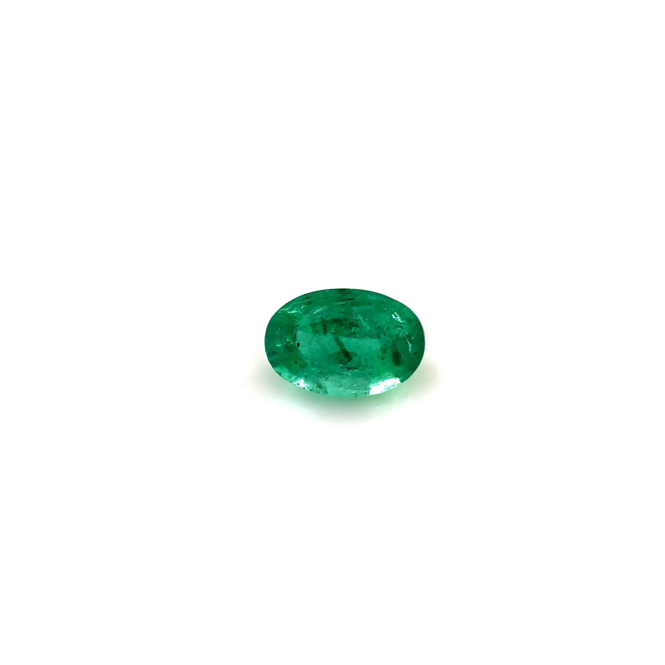 0.52ct Oval Natural Emerald (Colour Green, Clarity Slightly Included, Cut Faceted)