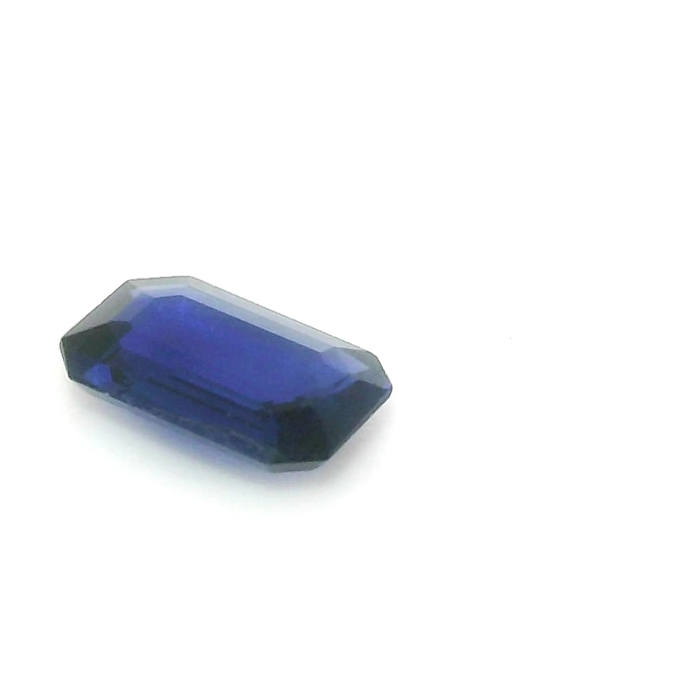 0.51ct Emerald Natural Sapphire (Colour Blue, Clarity Slightly Included, Cut Faceted)